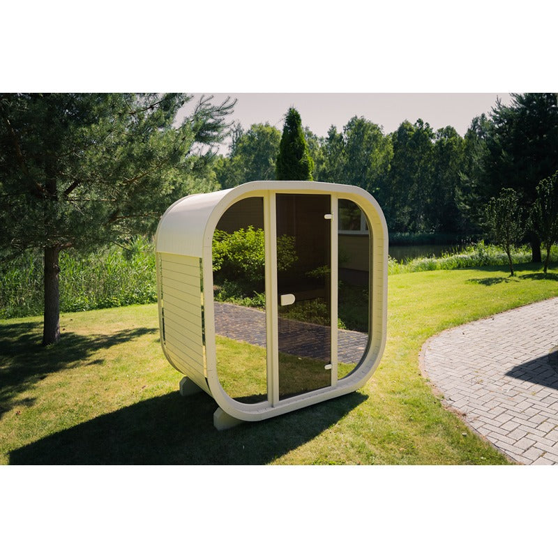 Celsium Ula Mini sauna in beige with all-glass front in the garden - modern Outdoor sauna for two Persons with natural surroundings and stylish design
